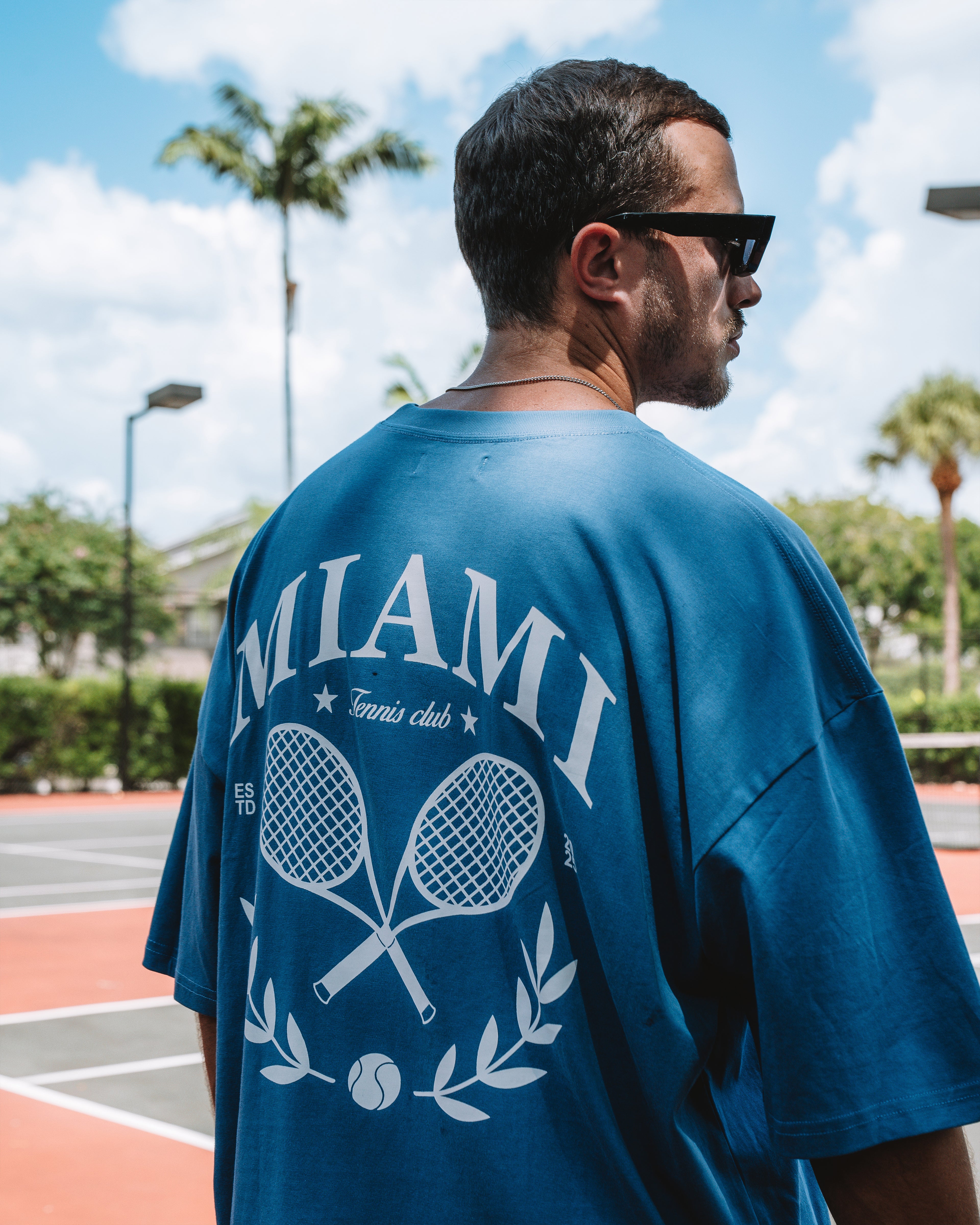 MIAMI TENNIS CLUB TEE – STEEL BLUE