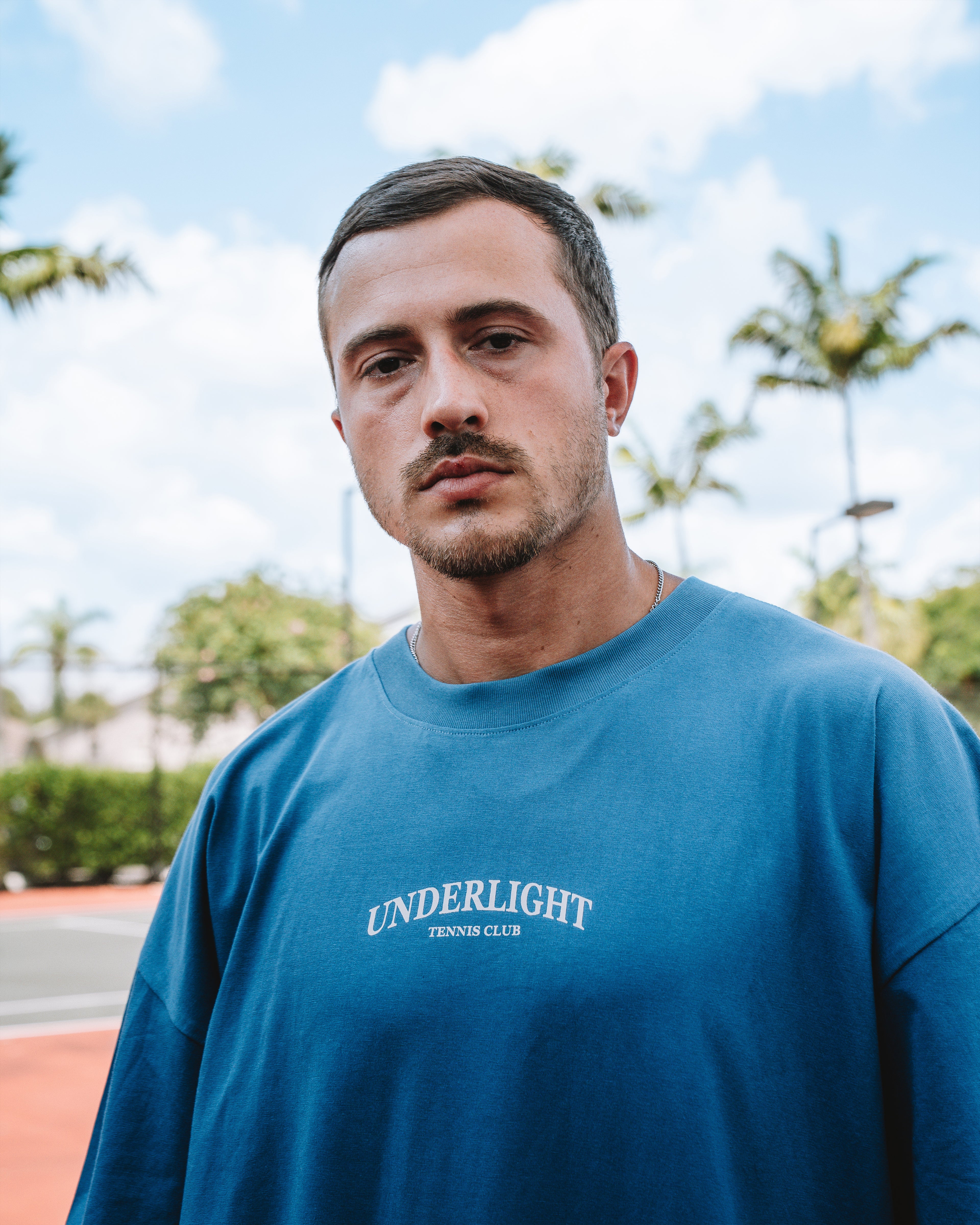 MIAMI TENNIS CLUB TEE – STEEL BLUE